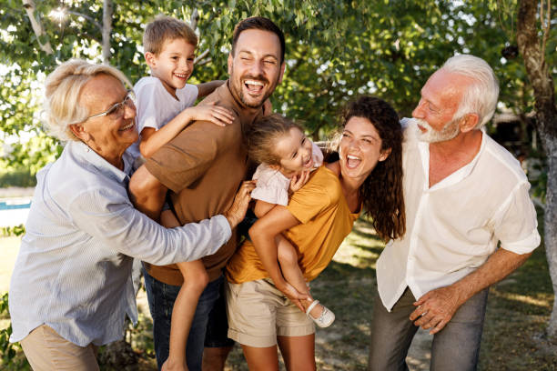 istock Cheerful extended family having fun in nature. 1959380907