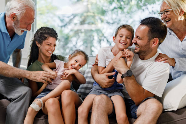 istock Playful extended family having fun at home. 1959392385