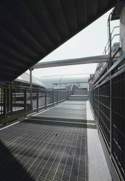 istock Metal walkway with stairs and railings 1959402360