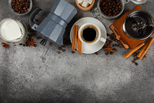 istock Ingredients for making coffee. Different ways to make coffee geyser moka maker,turkish coffee pots (cezve). Coffee making concept with milk, cinnamon and star anise. Flat Lay. Top view. Copy space 1959451569