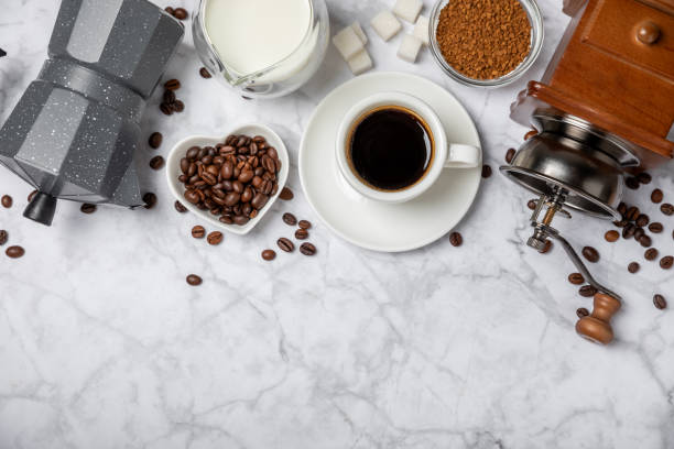 istock Ingredients for making coffee. Different ways to make coffee geyser moka maker,turkish coffee pots (cezve). Coffee making concept with milk, cinnamon and star anise. Flat Lay. Top view. Copy space 1959452087