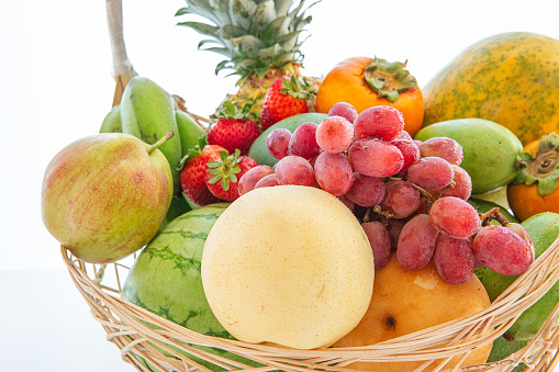 Exotic tropical fruits heap, healthy food, diet nutrition, vegetarian background