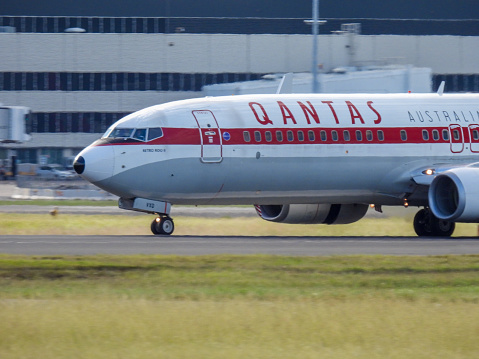 A Qantas Boeing B737-838 plane, registration VH-VXQ, in Retro 1959 Livery and named 
