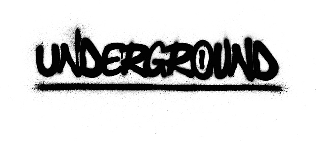 graffiti underground word sprayed in black over white