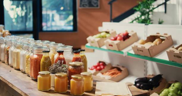 istock Bulk merchandise in reusable glass jars sold at zero waste store 1959534160