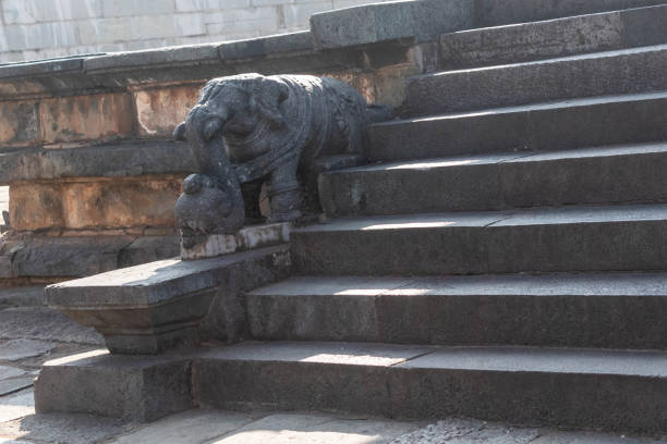 And ornately carved elephant on the stone steps to a shrine at the ancient Chennakeshava temple in Belur in Karnataka.