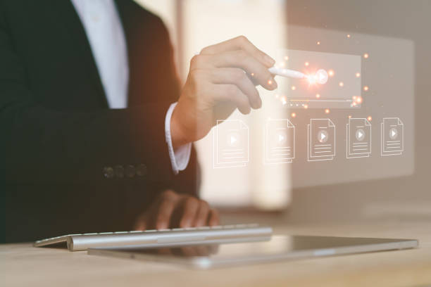 istock Multimedia Technology concept, Man using stylus to manage digital files, VDO content creation online streaming, online class, Social media, content creator, watching video on internet. 1959551554