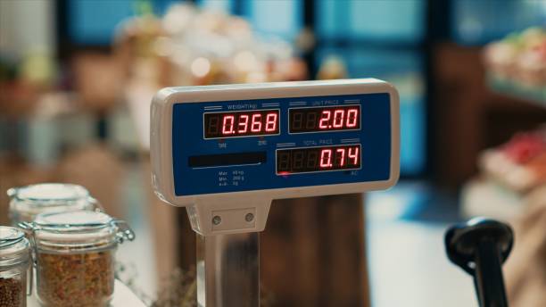 istock Local grocery store weighting scale at empty checkout counter, 1959552601