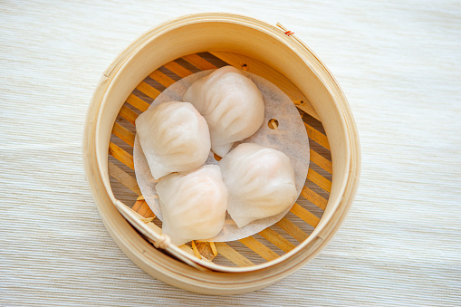 Steamed Prawn Dumpling Ha Kau served in dish isolated on table top view of food