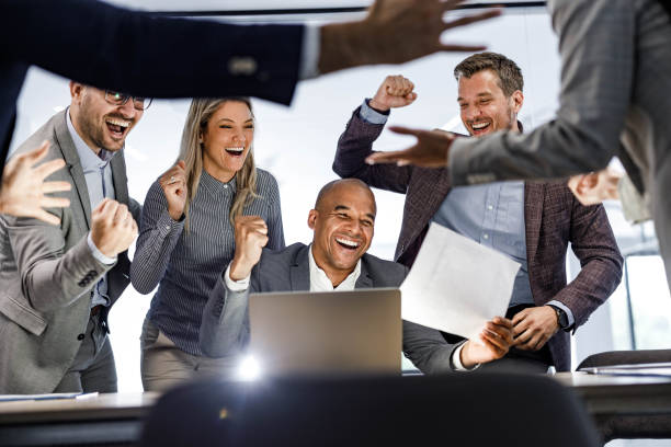 istock Celebrating good news in the office! 1959557459