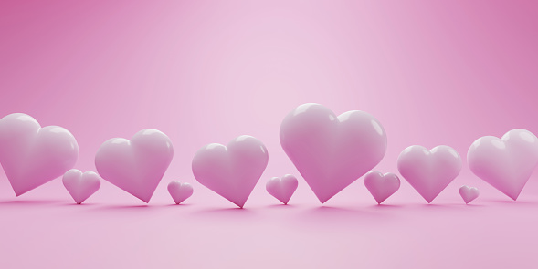 Three dimensional heart shapes on pink gradient background.Valentine's day concept stock illustration.