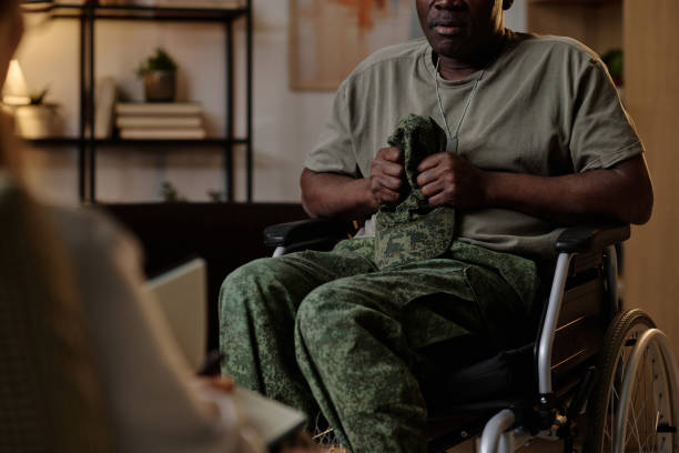 istock Traumatized War Veteran Having Emotional Conversation with Therapist 1959603372