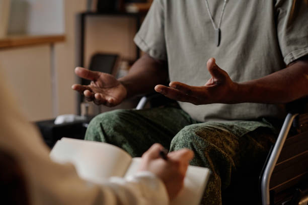 Mature Soldier Expressing His Emotions at Private Psychotherapy Session