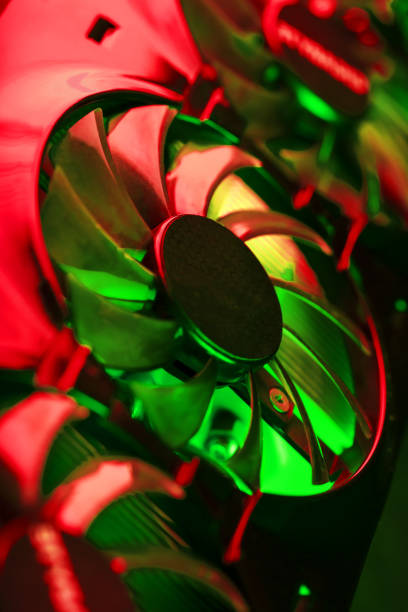 Powerful graphics card with three fans and a futuristic red-green neon backlight. High-tech GPU for gaming and mining of crypto farms