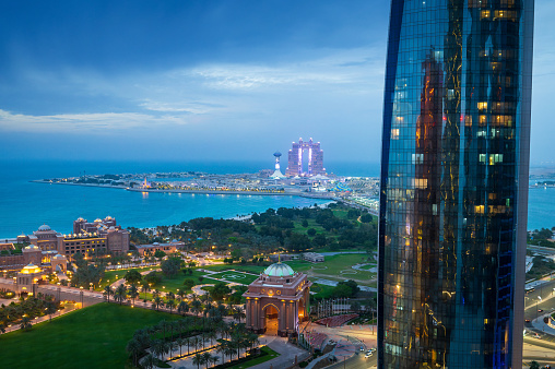 Marina island in Abu Dhabi top landmark skyline view with the city downtown in the United Arab Emirates capital city during the blue hour