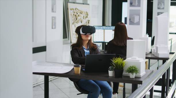 istock Woman architect working with vr glasses in startup office 1959629290