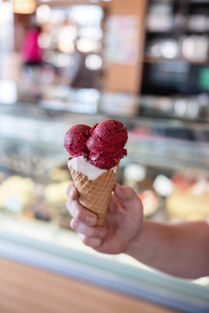 istock A Man Holding An Ice Cream Cone 1959651579
