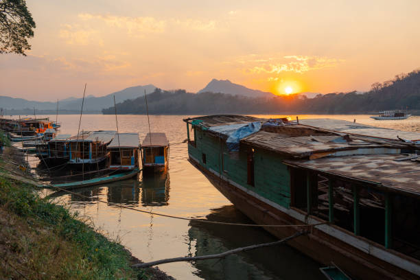 istock Boats on Mekong river at sunset 1959676930