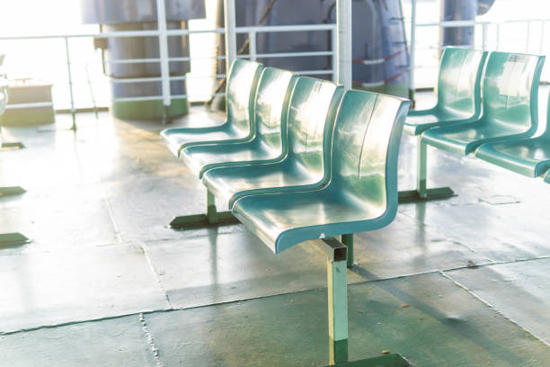 istock rows of empty passenger seats inside the ferry ship. 1959691223