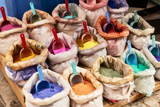 Open bags with multicolored pigment powder for paint in Chefchaouen, Morocco Open bags with multicolored pigment powder for paint in Chefchaouen, Morocco, North Africa. chefchaouen stock pictures, royalty-free photos & images