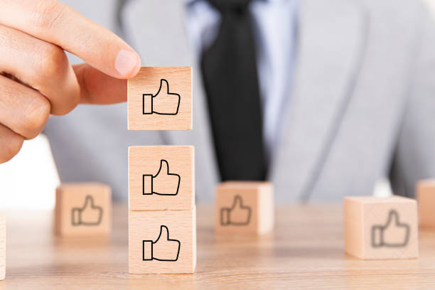 istock Businessman is Stacking Woden Cubes 1959730787