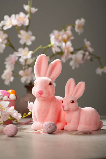 istock Easter chocolate candy eggs in basket and pink bunny decor 1959739205
