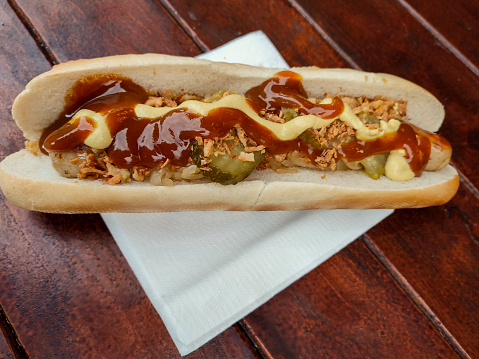 hot dog sausage sandwich with condiments at glasgow scotland england UK