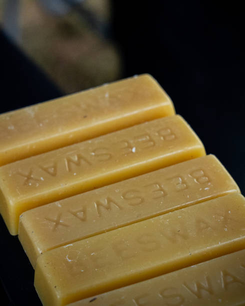 istock three bars of soap sitting on top of a black table 1959754907