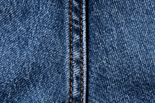 Texture of denim, cotton. Blue textile background