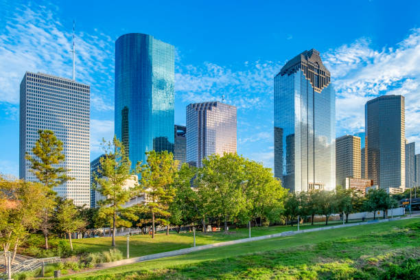 skyline of houston under blue sky. - houston-texas bildbanksfoton och bilder