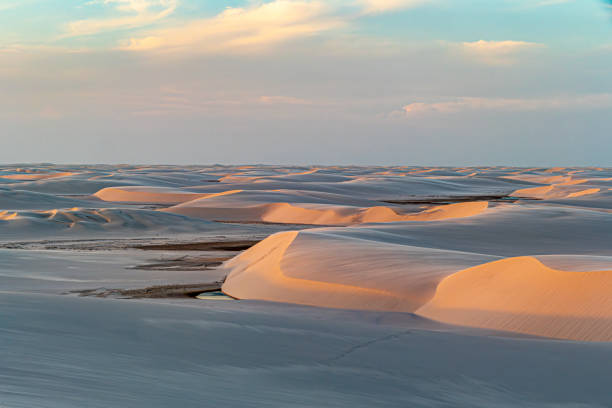 scenic desert dune landscape Lencois Maranhenses National Park - Parque Nacional dos Lencois Maranhenses in Brazil scenic desert dune landscape Lencois Maranhenses National Park - Parque Nacional dos Lencois Maranhenses in northeastern Brazil brazil desert maranhao state national park stock pictures, royalty-free photos & images