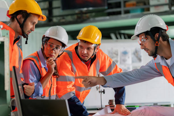 istock A team of dedicated engineers meticulously studying a factory layout on a computer. Professionals collaboratively analyze blueprints, paving the way for an ambitious transformation of the factory into a green energy powerhouse for long-term sustainability 1959827809