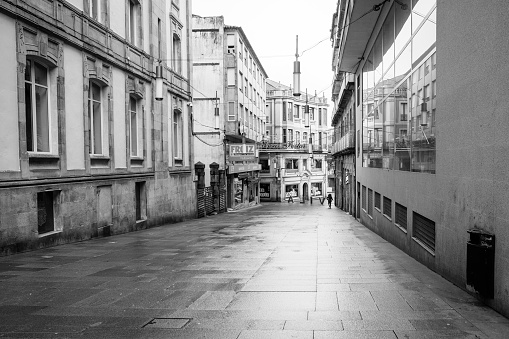 Pontevedra, Spain - December 8, 2020: Streets wet from rain in the historic center of the city, in the heart of the Rias Bajas.