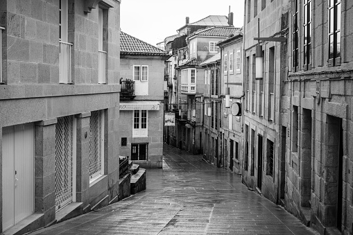 Pontevedra, Spain - December 8, 2020: Streets wet from rain in the historic center of the city, in the heart of the Rias Bajas.