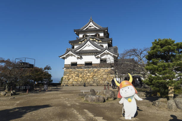 Hikone, Shiga, Japan - Nov 21 2023 : Hikone Castle and mascot Hikonyan