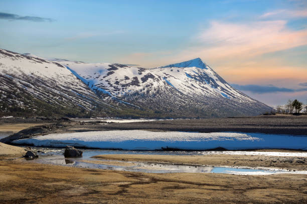 istock Spring at the lake Gjevilvatnet, Norway 1959879429
