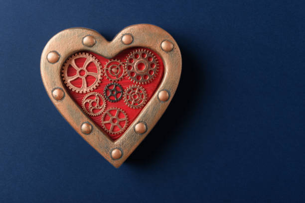 istock Steampunk Heart Ornament with Gears on Dark Blue Background 1959914467