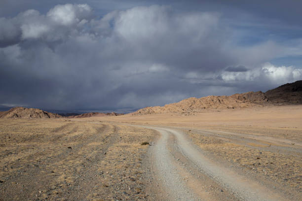 istock Steppe road in cloudy weather in Mongolia. 1959930013