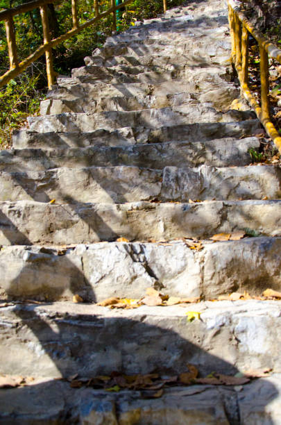 istock Beautiful stone steps in mountain landscape in China ( Huangshan ) during sunset. Mountain china 1959944362