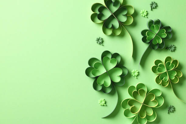 istock Paper art and craft style four leaf clover on green background. St Patrick's Day concept. 1959984257