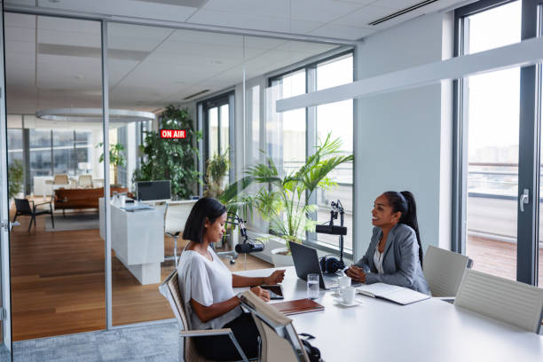 istock Confident Female Business Manager Recording a Podcast 1959997372