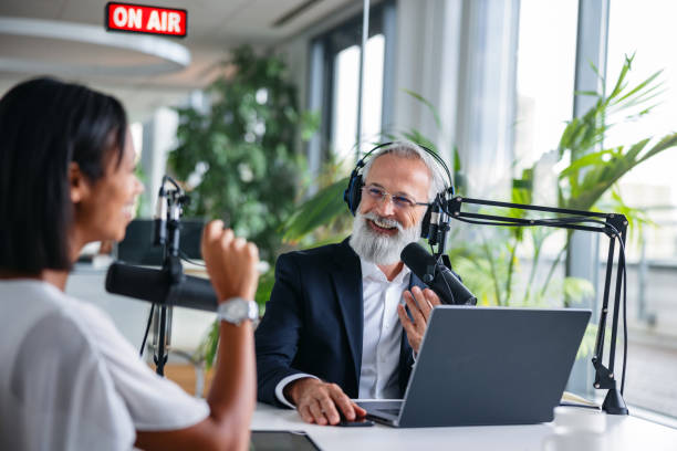 istock Diverse Business Dialogue During Live Podcast Recording 1959997377
