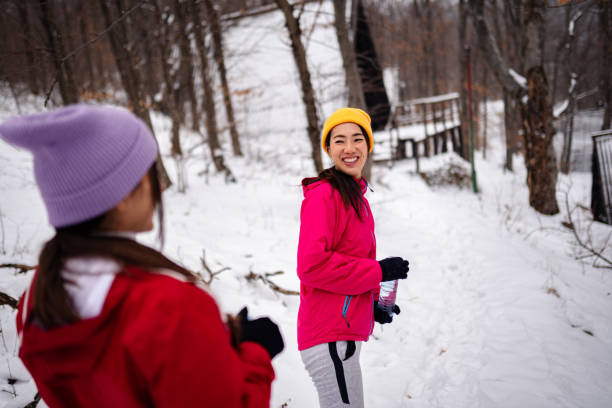 istock Snowy day and jogging in the park 1960006575
