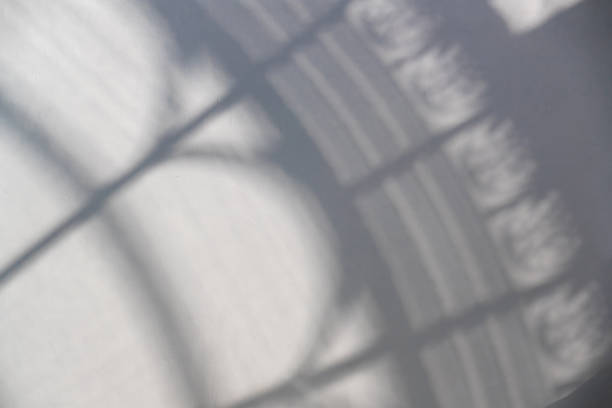 Shadow of vintage frame on white wall
