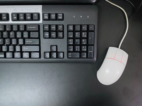 Black keyboard with white mouse