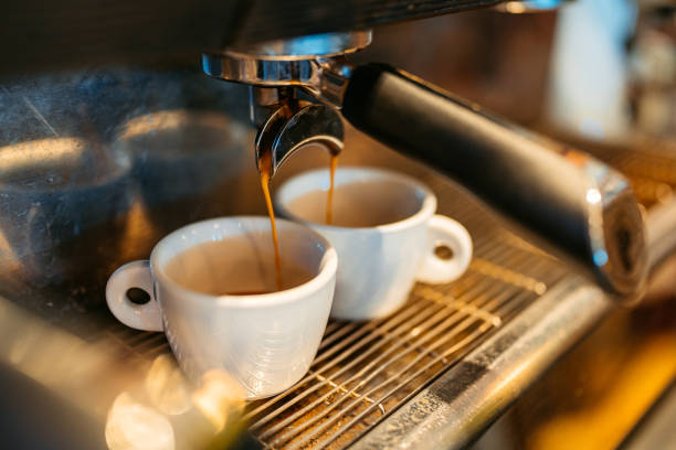 istock Coffee Being Poured In A Cup In A Coffee Shop 1960049409