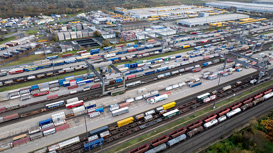 Radviliskis, Lithuania - April 21, 2020: Railway Network In Lithuania. Radviliskis is well known railway capital in Lithuania. Beautiful evening sunset light and cars in background.