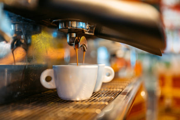 istock Coffee Being Poured In A Cup In A Coffee Shop 1960053370