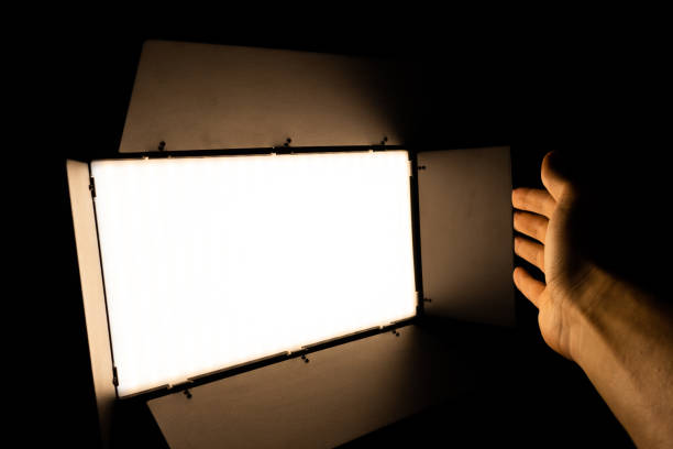 istock Professional photo or video lighting. SRGB Led-panel on tripod for home or studio shooting. Adjusting light equipment. 1960055492