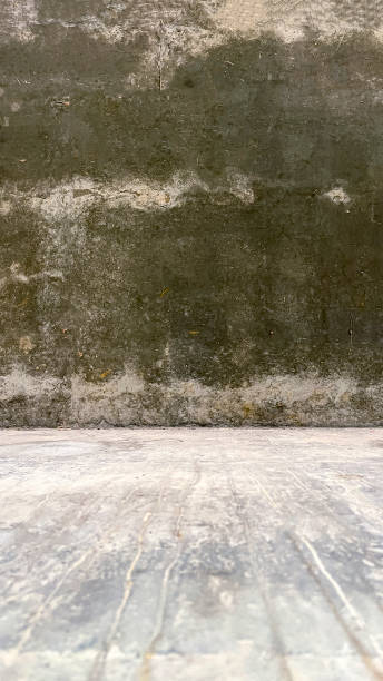 istock Textured concrete wall floor, concrete floor with concrete wall, gray gray stone texture concrete wall wallpaper tile background panorama banner, industrial concrete stage with floor and back wall 1960063316